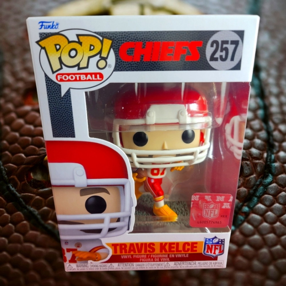 Travis Kelce funko # 257 (nib) With pop protector